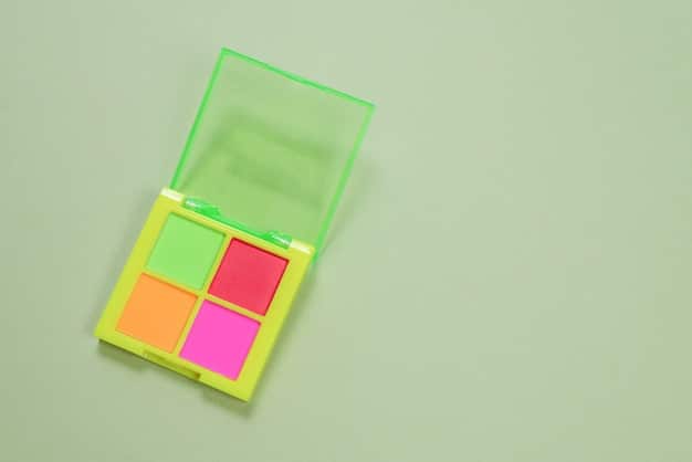 A flat lay image featuring swatches of muted neon colors like pastel pink, mint green, soft yellow, and lavender. These colors are arranged next to modern tech accessories such as a smartphone, wireless earbuds, and a minimalist laptop, all showcasing the color palette's integration with technology and modern design.