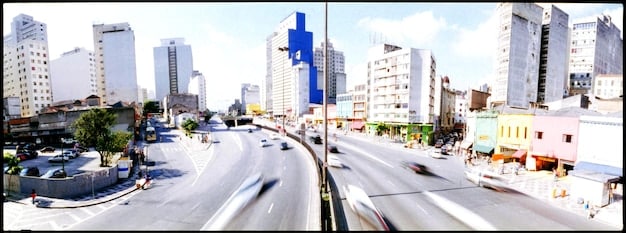 A split-screen showing a photo of a city skyline, one with the original colors and the other with the 