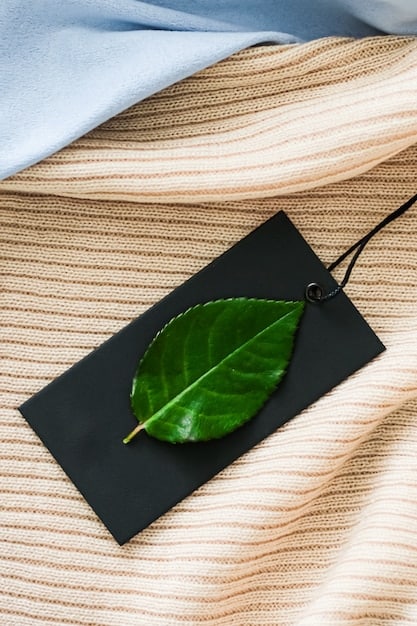 A close-up shot of a garment label from Shein's sustainable collection, clearly displaying the eco-friendly materials used, such as recycled polyester and organic cotton. The label also includes information about water reduction and ethical production practices.