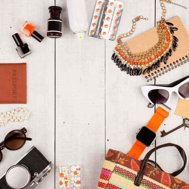 A flat lay of various Shein accessories and small clothing items, all tagged with 