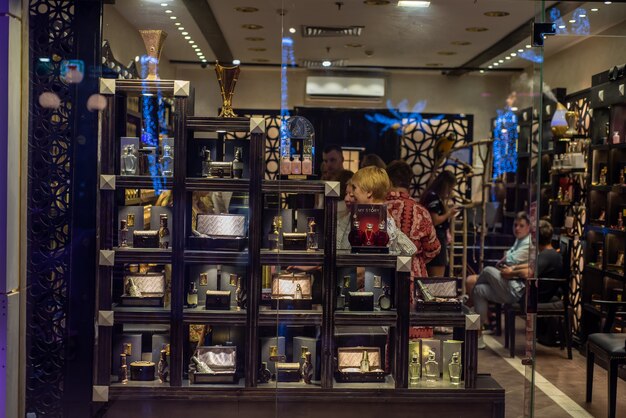 A brightly lit display at a discount retailer, showcasing a variety of accessories such as scarves, hats, and jewelry, with prominent sale and discount signs. Illustrates shopping smart for accessories, guided by The 2025 Guide to Accessorizing on a Budget: Style Without Breaking the Bank.