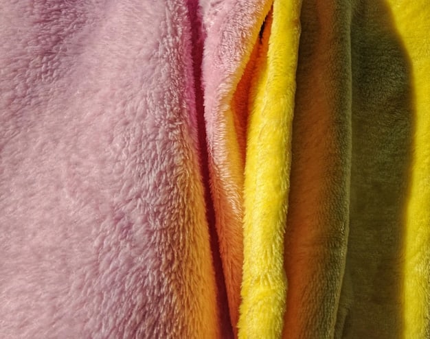 A close-up shot of a variety of fabrics and textures anticipated in ASOS 2025 collection, including recycled denim, organic cotton, and innovative sustainable materials. The image is highly detailed, capturing the weave and feel of each fabric, highlighting ASOS commitment to sustainability in their upcoming designs, relevant to Trying on the Latest ASOS Trend Haul: A 2025 Style and Quality Test.