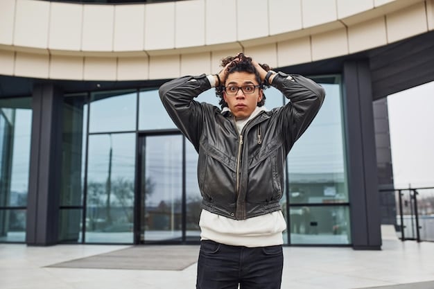 A person shown from the waist up, trying on a stylish ASOS jacket. The jacket showcases details like the fabric texture, fit around the shoulders, and overall silhouette, providing a clear visual of how the clothing fits on the body. This relates directly to the 'Trying on the Latest ASOS Trend Haul: A 2025 Style and Quality Test' concept.