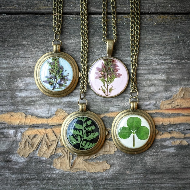 A collage featuring three different types of personalized jewelry: a necklace with a custom-designed pendant, a bracelet with engraved coordinates, and a pair of earrings with birthstones. Each piece is displayed individually to highlight their unique personalized elements, reflecting the trend discussed in Will the popularity of personalized jewelry continue its upward trend in 2025?.