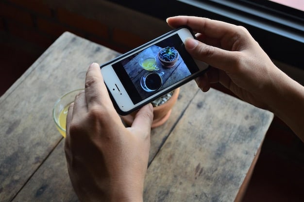 A photographer's hand adjusting settings on a professional photo editing software interface, with a vibrant and consistent Instagram feed displayed on a second monitor.