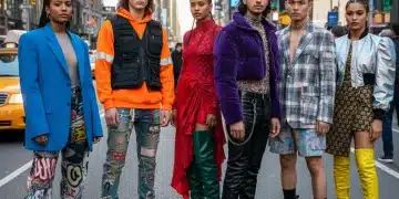 Diverse individuals displaying modern street style fashion in an urban environment.