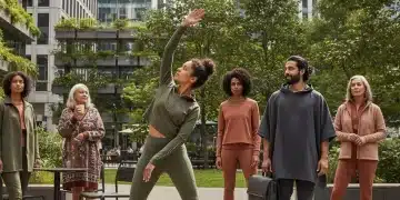 Diverse individuals showcasing 2026 athleisure trends in an urban environment, blending comfort and style.